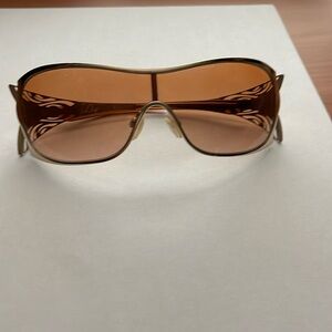 Woman's gold Oakley Liv Sunglasses